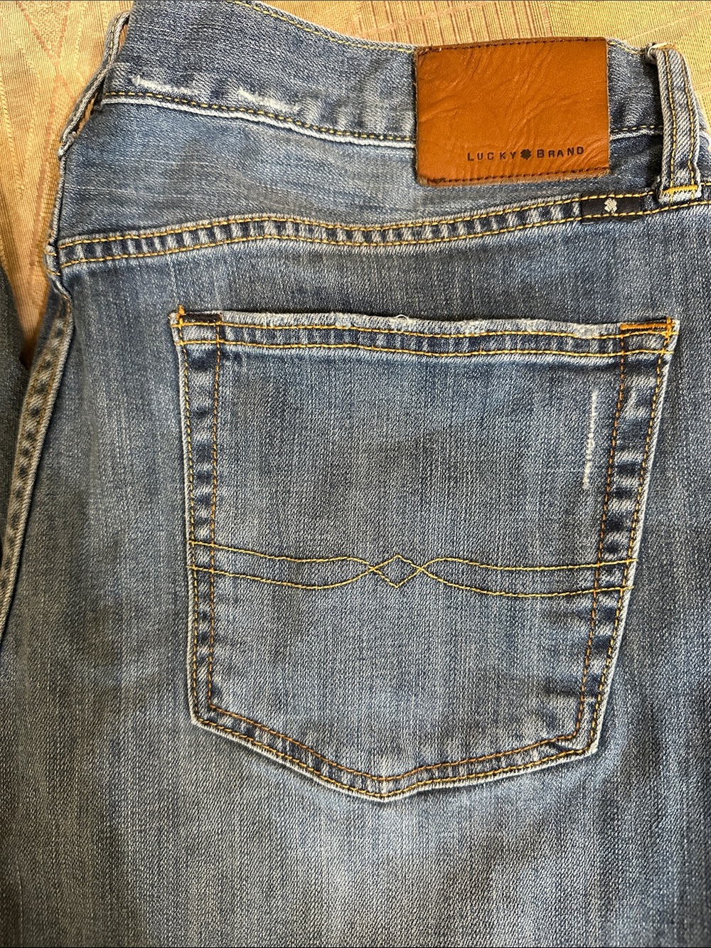 Lucky Brand Men's Medium Blue Straight Jeans with Tan Leather Patch